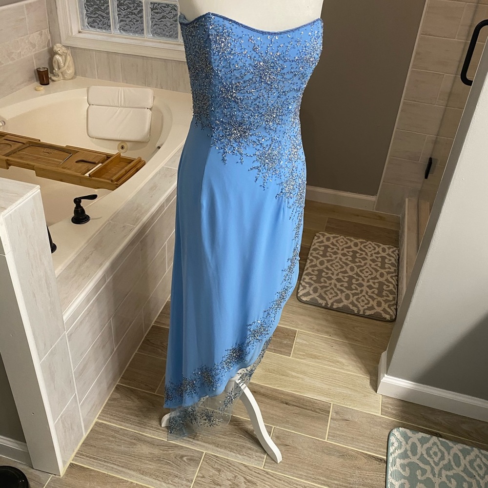 High/low asymmetrical cocktail gown.